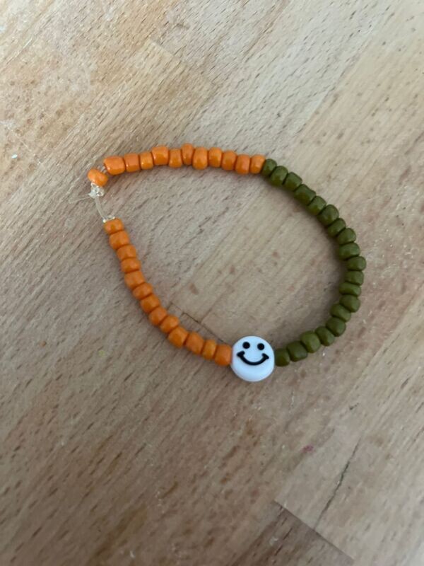 Armband  Smiley oranjegroen