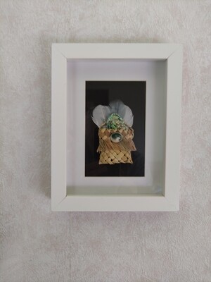 Kete with feathers &amp; paua