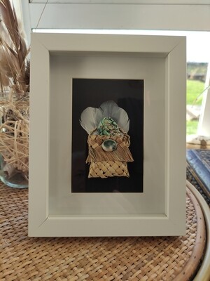 Kete with feathers &amp; paua