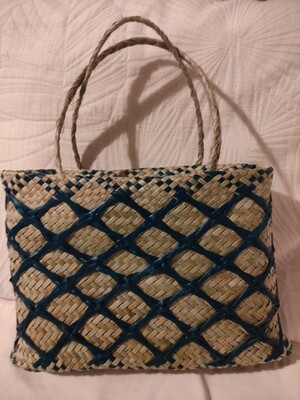Natural harakeke kete with kupenga overlay