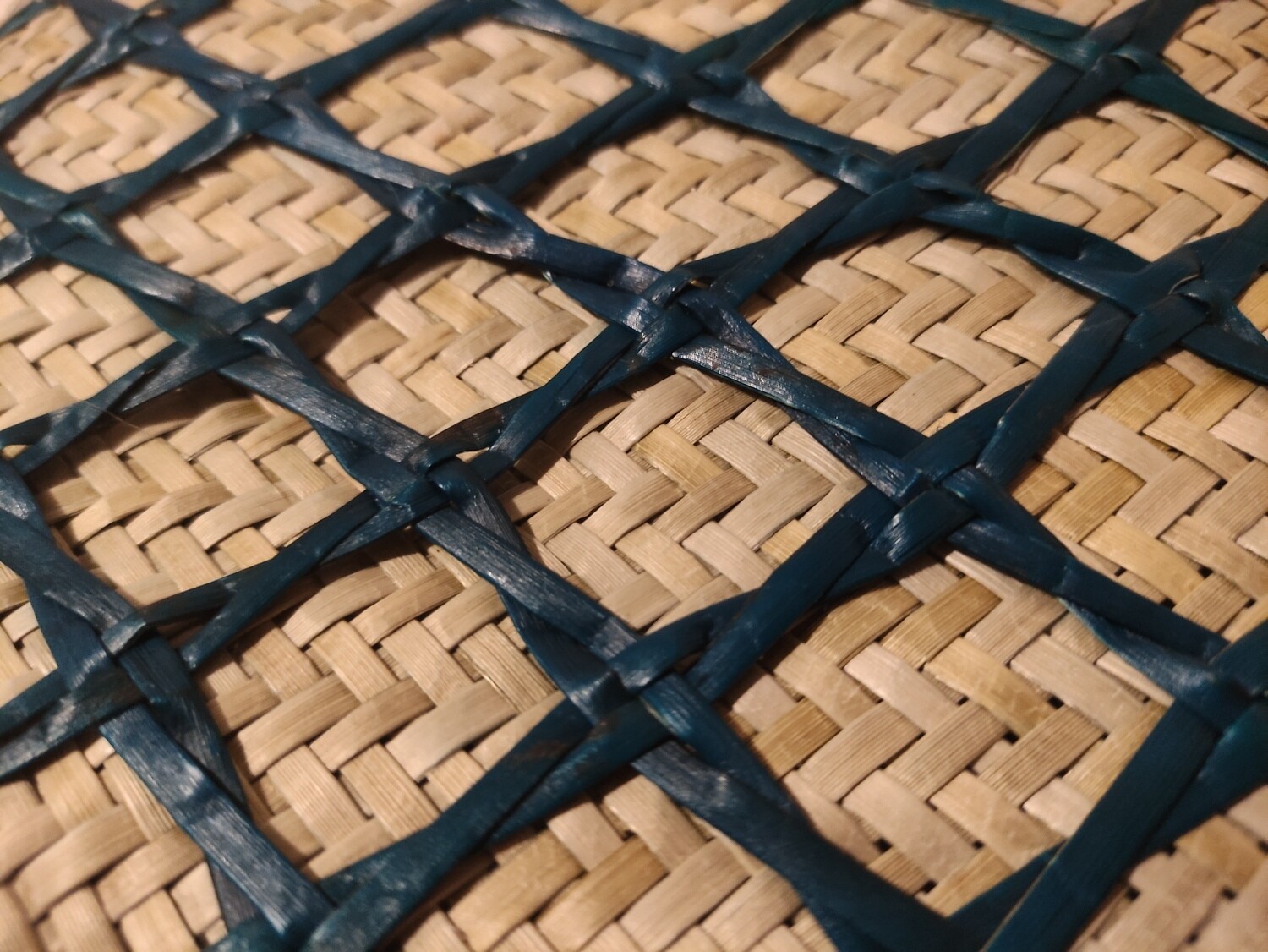 Natural harakeke kete with kupenga overlay