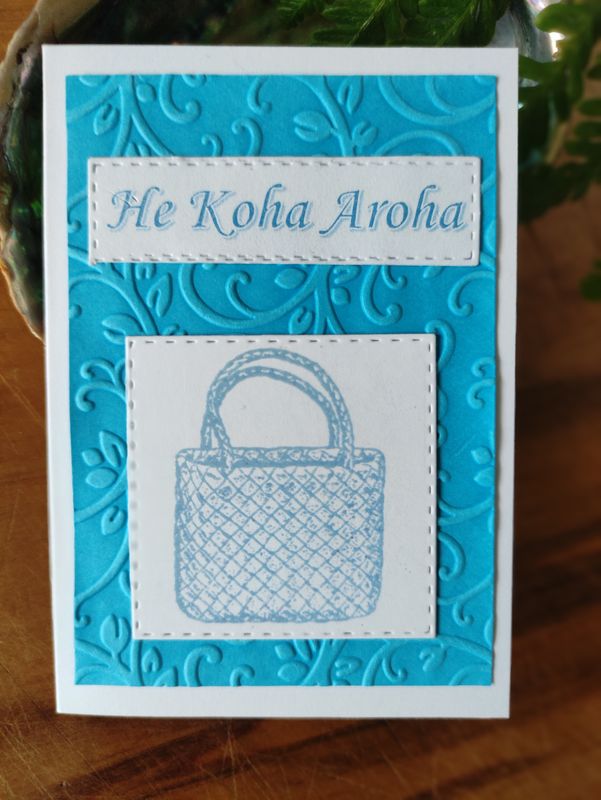 Bright blue embossed &quot;He Koha Aroha&quot; Mini 
Card