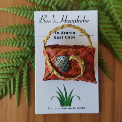 Orange &amp; natural harakeke kete magnet with paua shell