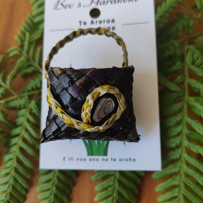 Dark brown/purple kete brooch, natural handle &amp; paua shell