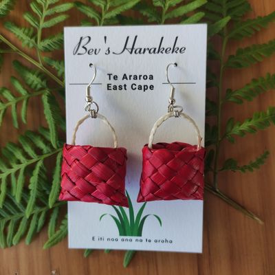 Red mini-kete earrings with muka handles