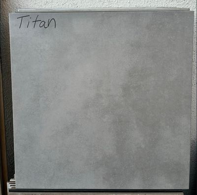 $ 14.990  M2 PORCELANATO TITAN 60x60 CMS                                        CAJA 1,44 M2