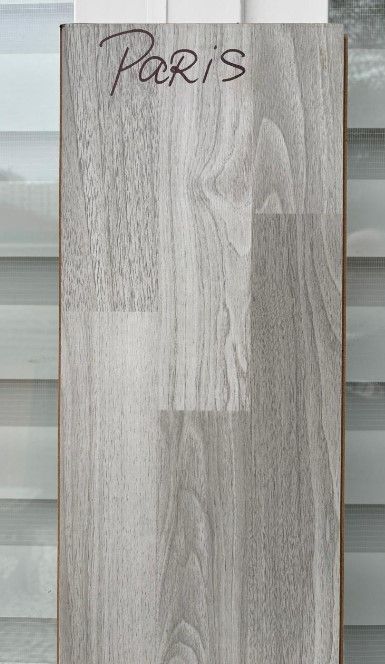 $9.990 M2  PISO FLOTANTE  8.0 MM PARIS 20 CM X 1.2 MT CAJA RINDE 2,44 M2