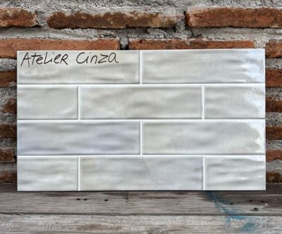 $8.990 M2  CERAMICA ATELIER CINZA  31X56 CM   CAJA 1.92 M2