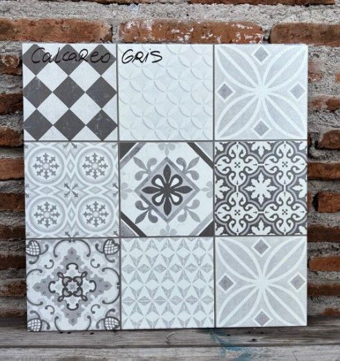 $9.990 M2 CERAMICA CALCAREO GRIS 56X56          CAJA 2,17 M2