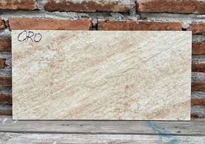 $12.990 M2 FACHALETA PORCELANATO ORO 30X60 CMS  CAJA 1.44 M2