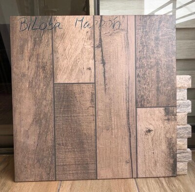 $ 8.990 M2 CERAMICA BILOBA MARRON 51X51 CMS CAJA 2,08 M2