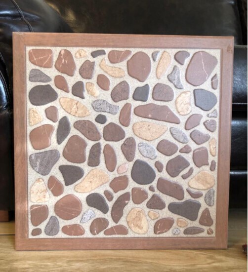 $ 7.990 M2 CERAMICA PEDREGAL MARRON 2.0   46X46 CMS  CAJA 2,58 M2