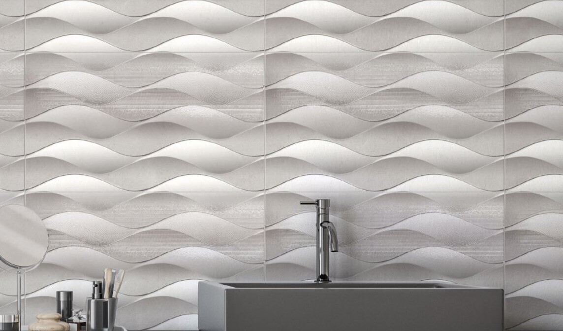$ 9,990  M2 CERAMICA ONDAS BL  33X57 CMS CAJA 2.5 M2