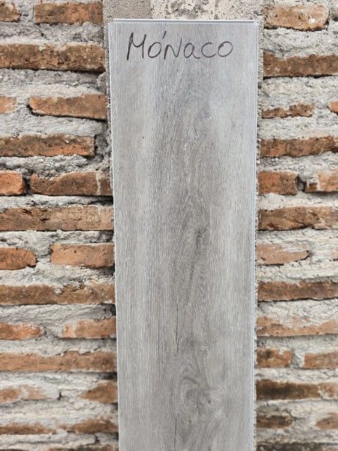 $21.990 M2  SPC MONACO 9.0  MM                       23 CM X 1.22 MT                       CAJA 1.403 M2