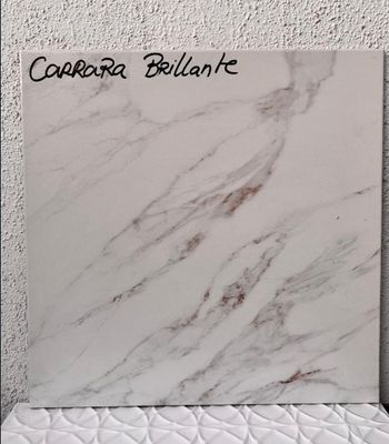 $ 9.990 M2 CERAMICA MARMOL CARRARA  56X56 CMS  CAJA 2,17 M2
