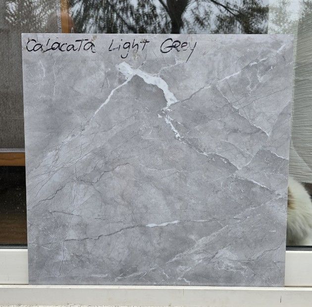 $14.990 M2  PORCELANATO PULIDO CALACATA LIGHT GREY 60X60 CMS  CAJA 1,44 M2