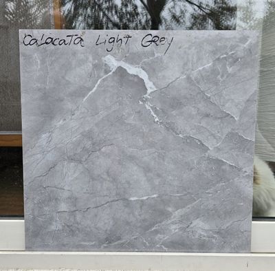 $14.990 M2  PORCELANATO PULIDO CALACATA LIGHT GREY 60X60 CMS  CAJA 1,44 M2