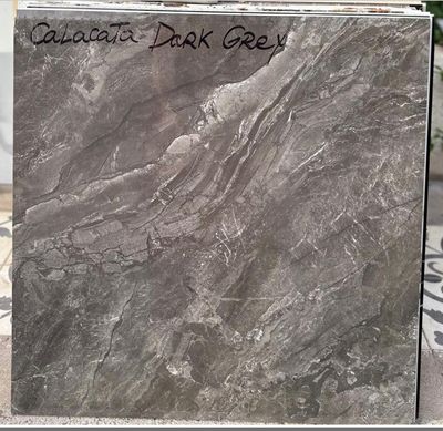 $15.990 M2  PORCELANATO PULIDO CALACATA DARK GREY 60X60 CMS  CAJA 1,44 M2
