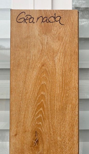 $9.990 M2  PISO FLOTANTE  8.0 MM GRANADA 20 CM X 1.2 MT CAJA  2,44 M2