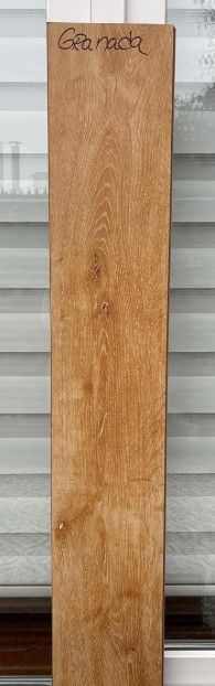 $9.990 M2  PISO FLOTANTE  8.0 MM GRANADA 20 CM X 1.2 MT CAJA  2,44 M2