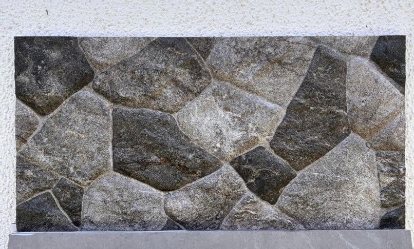 $18.990 M2 FACHALETA PORCELANATO PIEDRA PRETO  30X60 CMS  CAJA 0.9 M2
