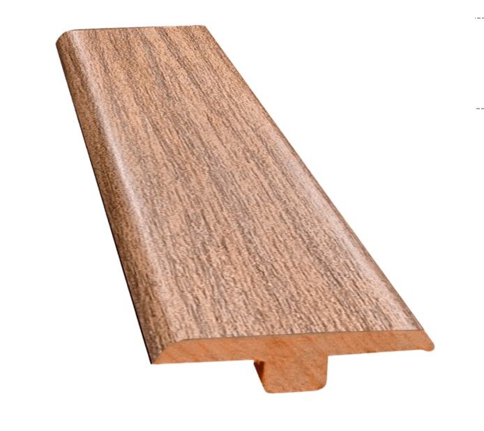 $ 9.990 TIRA   CUBREJUNTA DE TRANSICION  1X4.5X240 CMS FOLIO  CANELA