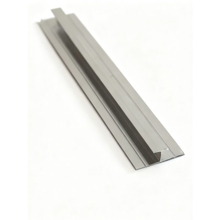 $6.990 TIRA PERFIL ALUMINIO UNION PANEL SPC COLOR CROMO LARGO 2.4 MT