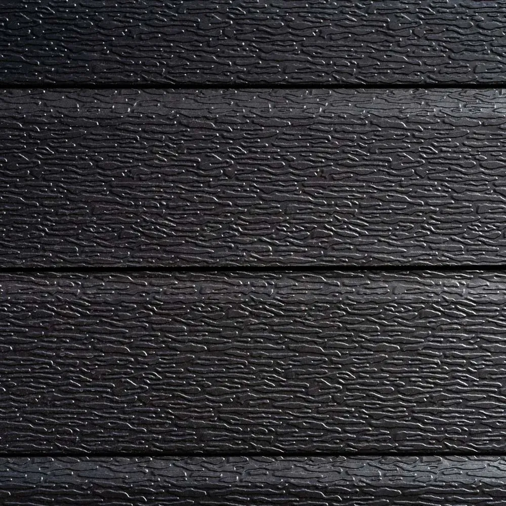 $21.990  REVESTIMIENTO EXTERIOR EMBOSSE BLACK  MIDE 38.5 CM X 3.8 MT  RINDE 1.463 M2