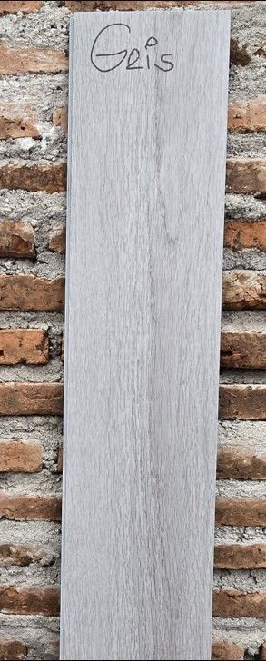$12.990 M2 SPC GRIS 5.3 MM  18.2 CM X  1.22 MT CAJA 2,22 M2