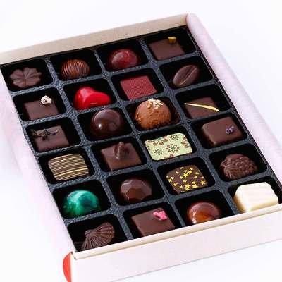 Gift Box of 24 beautiful dark, milk and white artisan chocolates, handmade to satisfy a range of tastes. Made with only the best chocolate and fillings - no preservatives so flavours are vibrant.