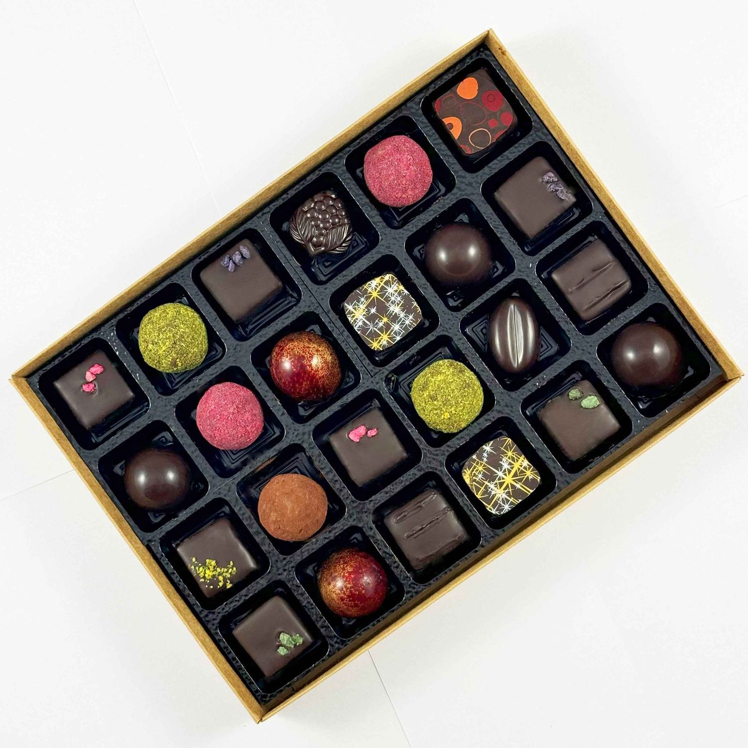 Dark Chocolate Selection Box. Hand made with only the best chocolate and fillings - no preservatives, so flavours are vibrant and real. Packaged in an eco-friendly box. Dark Chocolate Selection Box. Hand made with only the best chocolate and fillings - no preservatives, so flavours are vibrant and real. Packaged in an eco-friendly box.