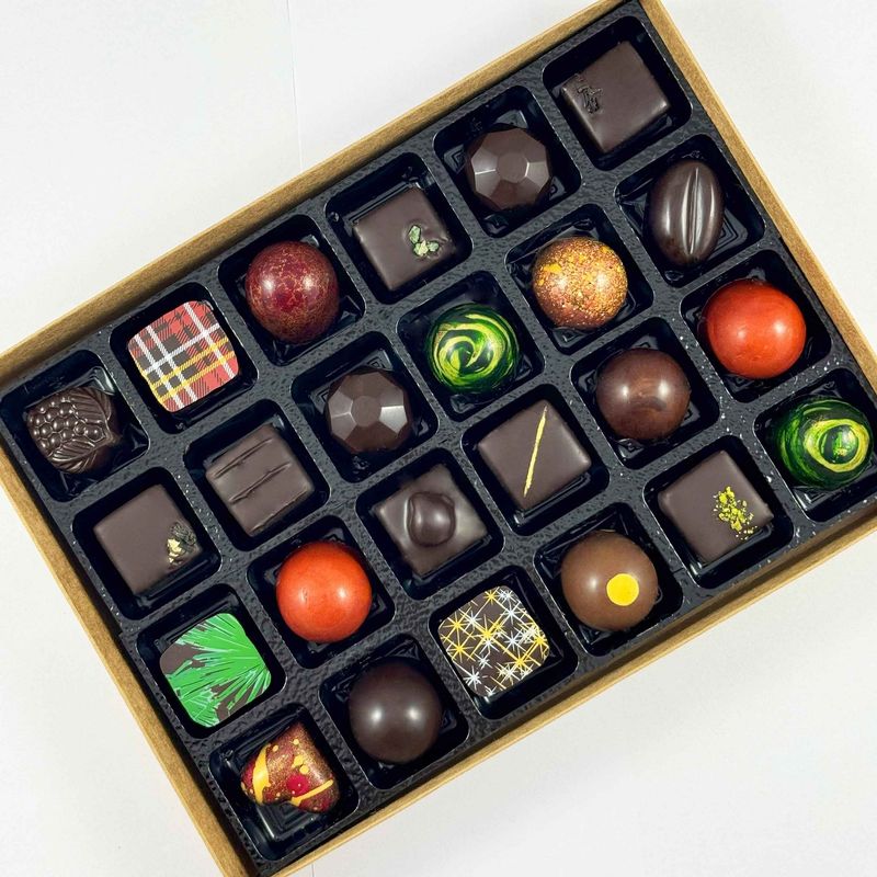 Gift Box  of 24 beautiful artisan chocolates,  Made with only the best chocolate and fillings - no preservatives so flavours are vibrant.