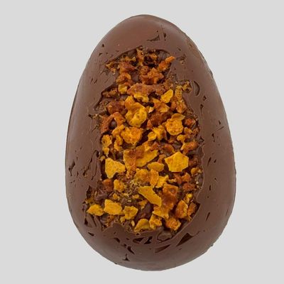 Milk Chocolate Easter Egg with Honeycomb: 42 percent cocoa mass milk chocolate Milk Chocolate Easter Egg with Honeycomb: 42 percent cocoa mass milk chocolate