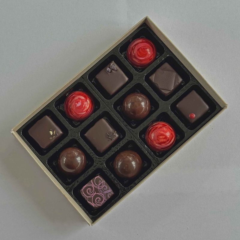 Mother's Day Gift box of 12 Artisan Chocolates - special selection of six flavours combining the fragrances and tastes of spring with nut and caramel classics