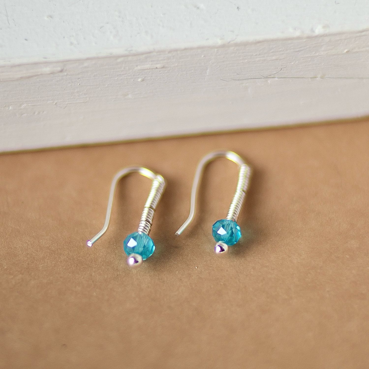 SP Light Blue Huggies Earrings