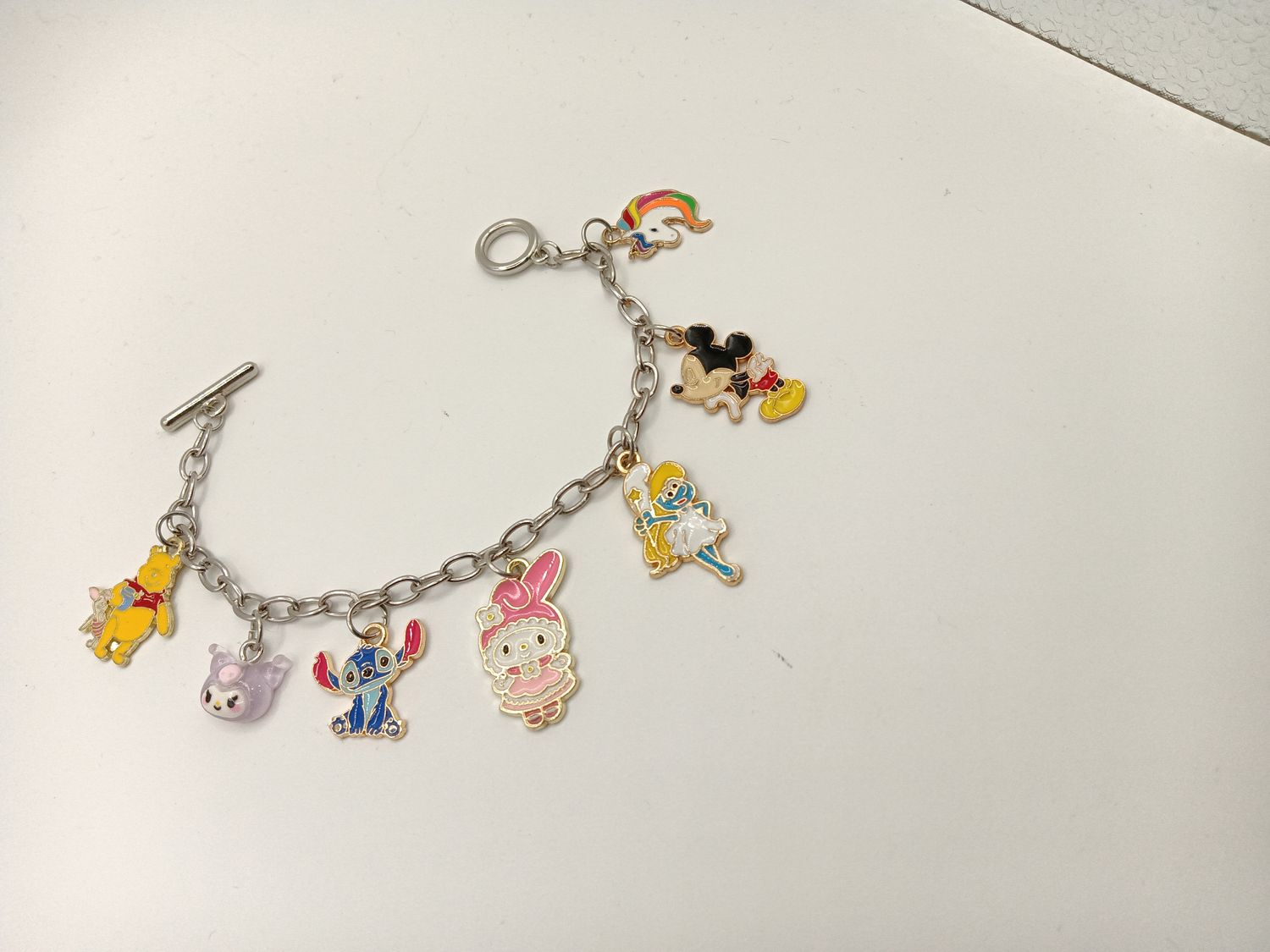 Disney-Inspired Charm Bracelet – Pooh, My Melody, Mickey & Stitch Character Bracelet Disney-Inspired Charm Bracelet – Pooh, My Melody, Mickey & Stitch Character Bracelet