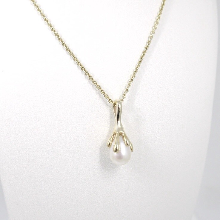 Melted pearl pendant in gold