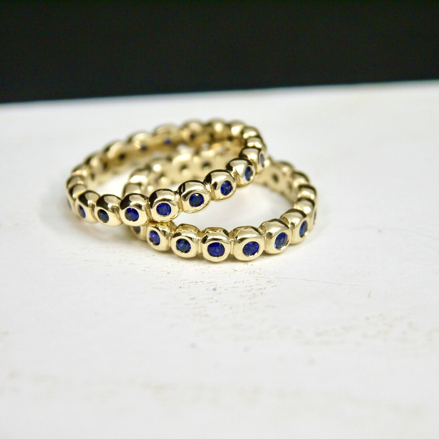 Bubble eternity ring with sapphires