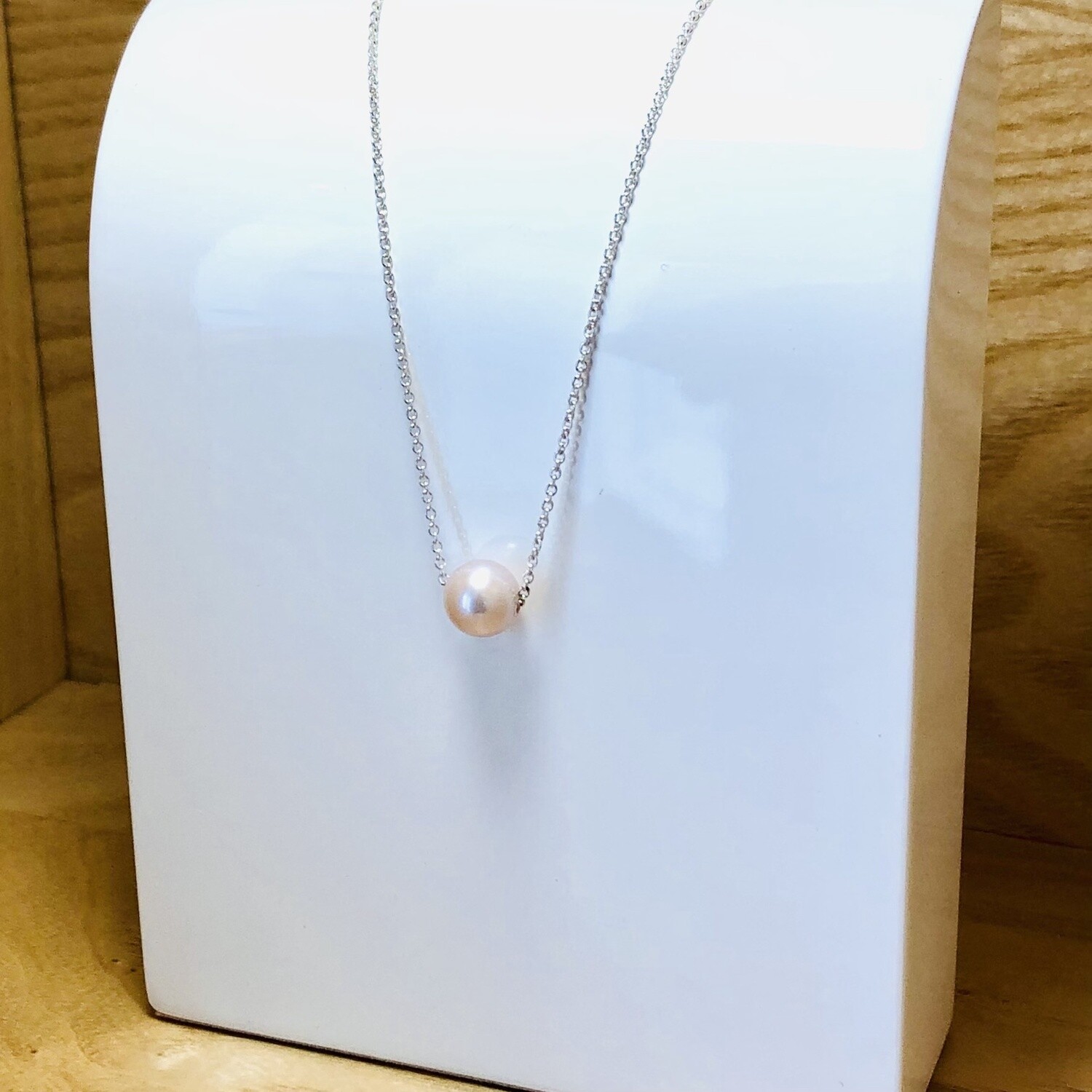 Floating pearl on silver chain