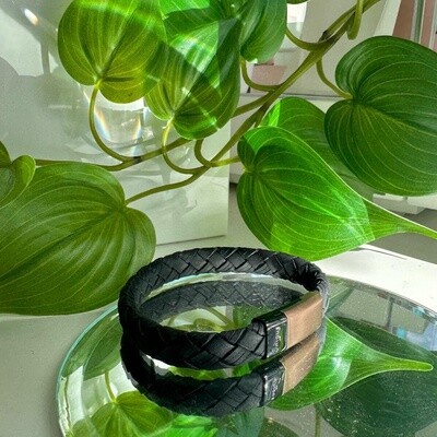 Black leather bracelet with brown clasp