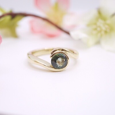 Teal sapphire wave ring
