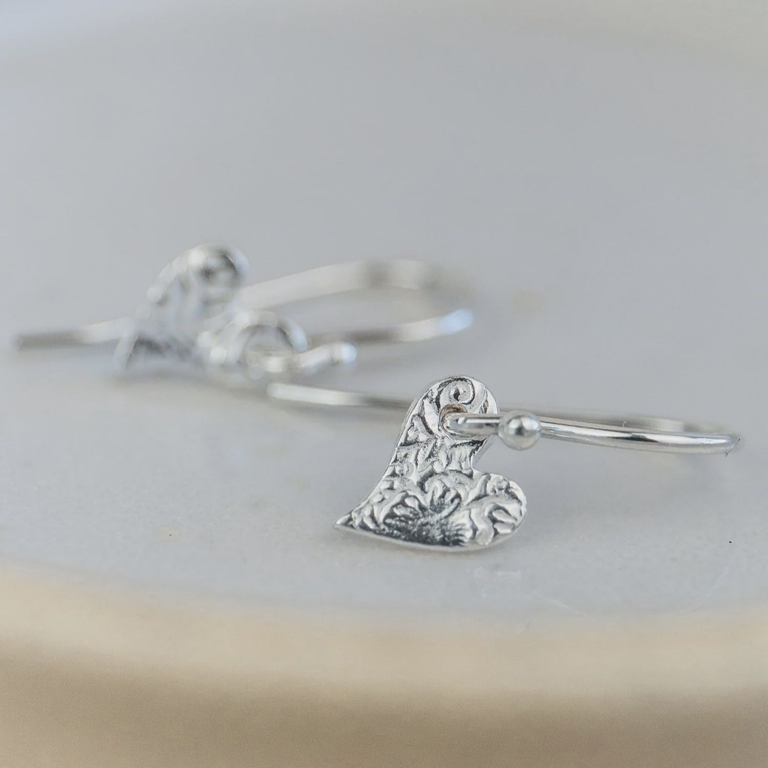Tilted heart textured earrings