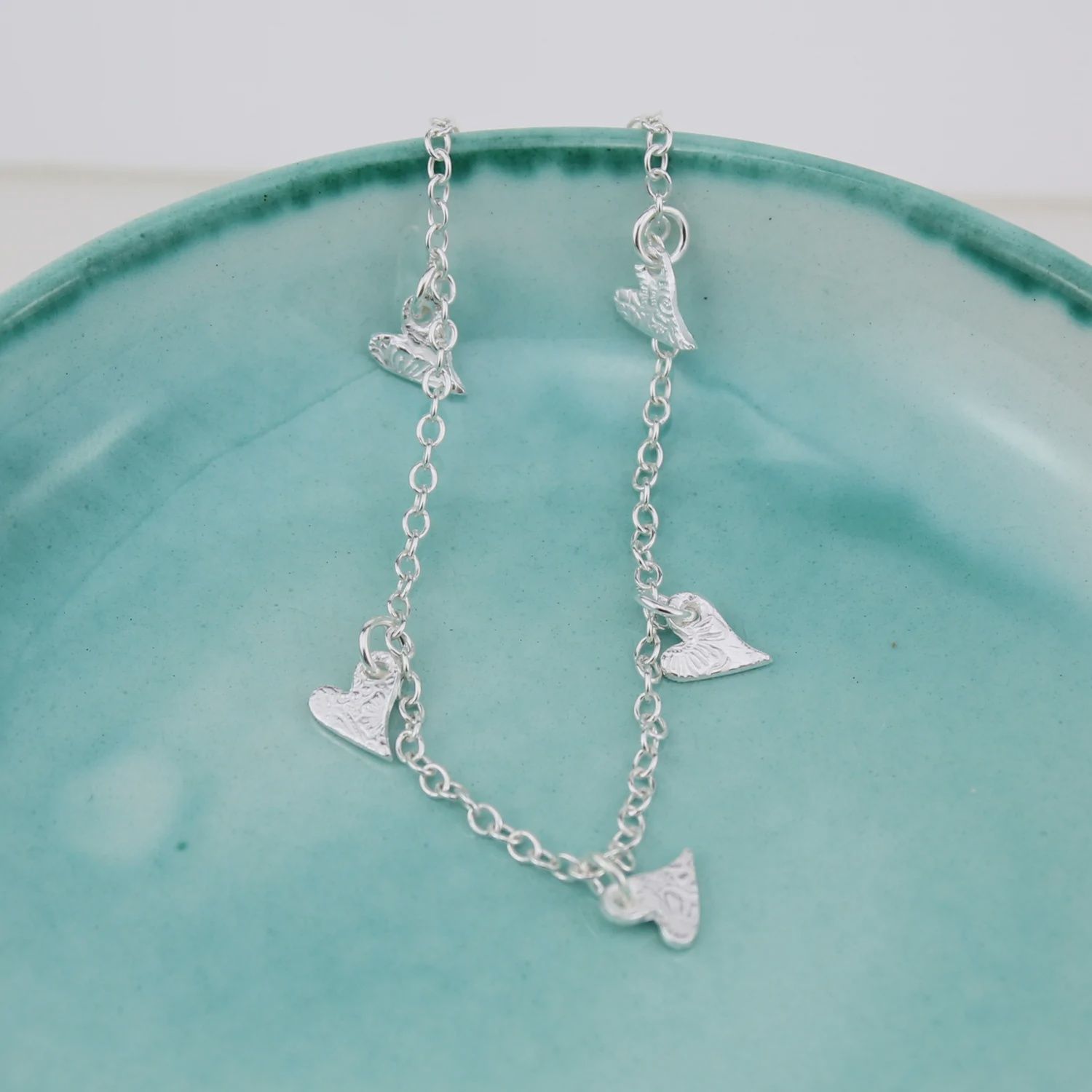 Tilted heart charm bracelet