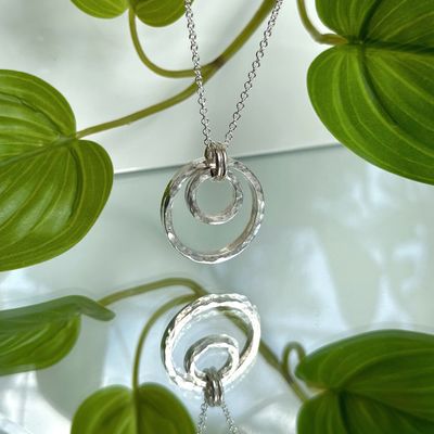 Hammered double halo pendant