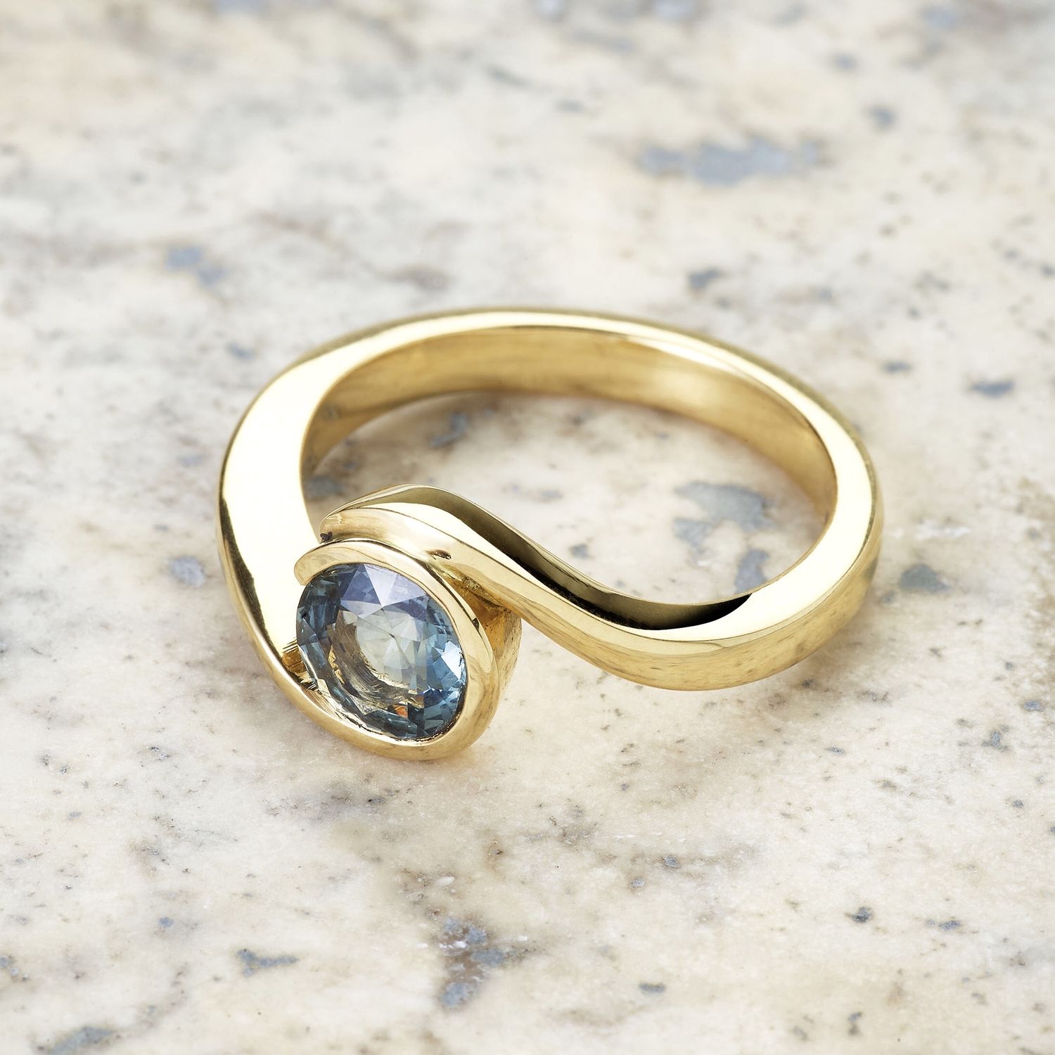 Teal sapphire wave ring
