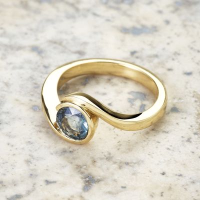 Teal sapphire wave ring