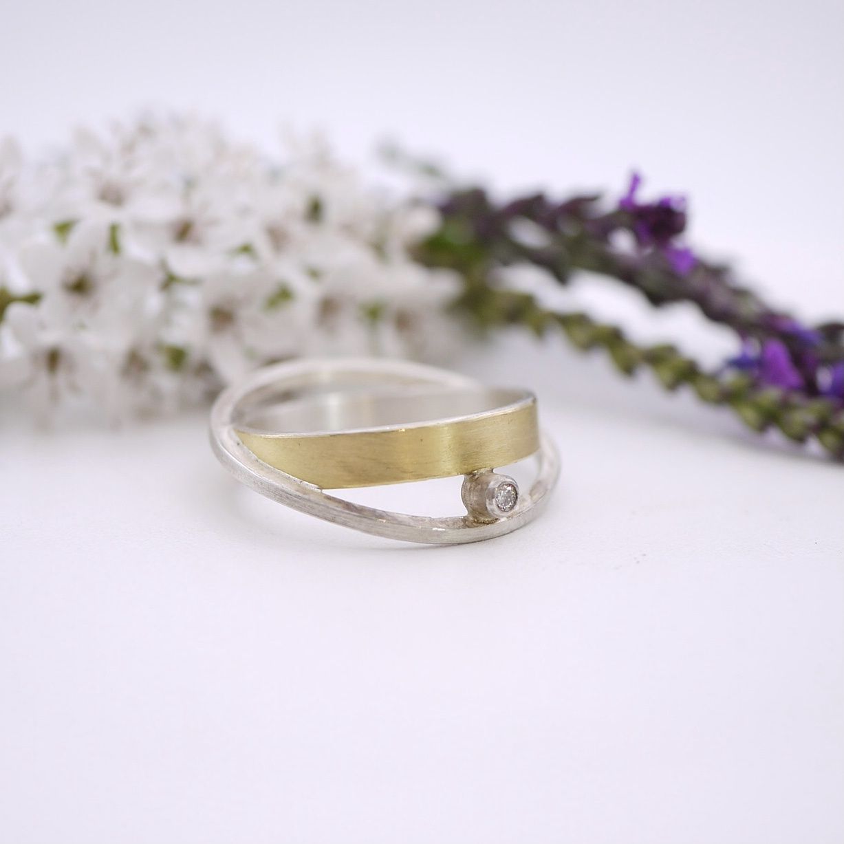 Peek-a-boo ring with diamond