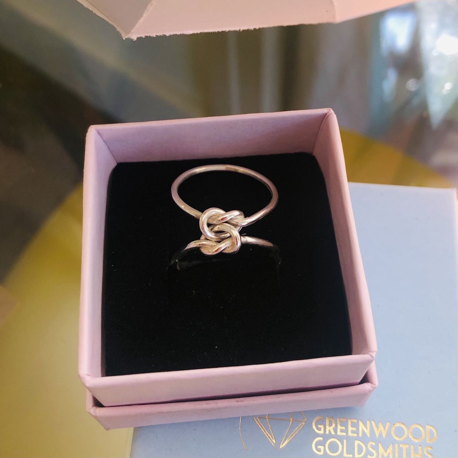 Double love knot ring