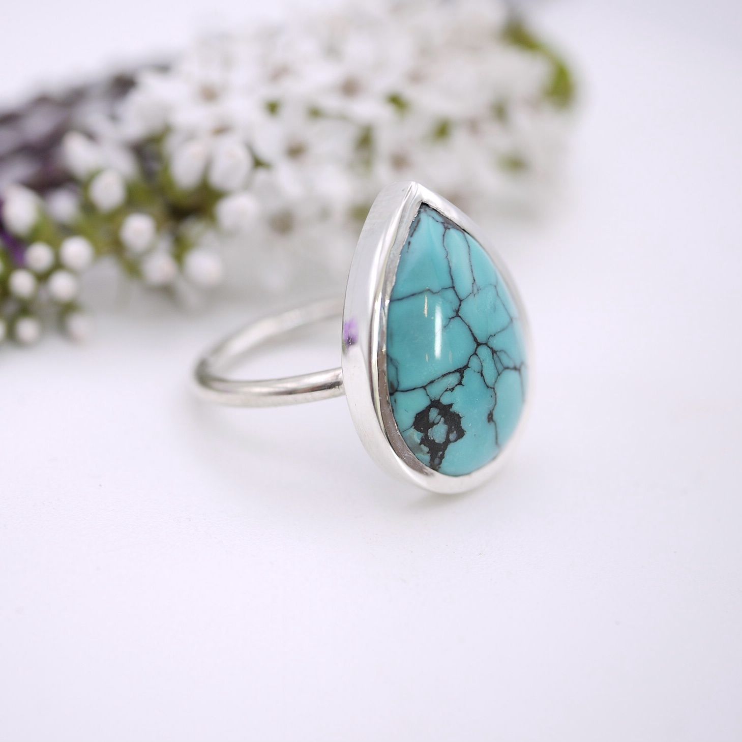 Pear shaped turquoise ring in silver