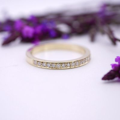 Diamond half eternity ring in gold